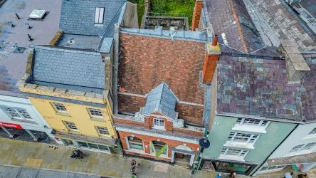 Attractive Grade II listed former bank in this prominent position in the centre of Monmouth with accommodation over three floors including the basement.