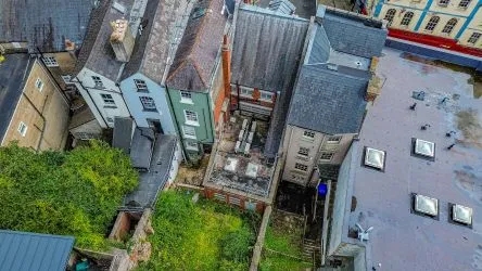 Attractive Grade II listed former bank in this prominent position in the centre of Monmouth with accommodation over three floors including the basement.
