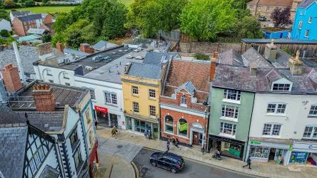 Attractive Grade II listed former bank in this prominent position in the centre of Monmouth with accommodation over three floors including the basement.