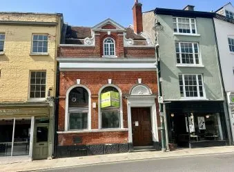 Attractive Grade II listed former bank in this prominent position in the centre of Monmouth with accommodation over three floors including the basement.