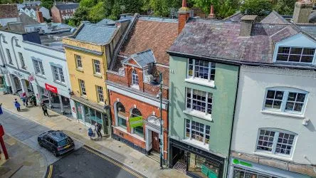 Attractive Grade II listed former bank in this prominent position in the centre of Monmouth with accommodation over three floors including the basement.