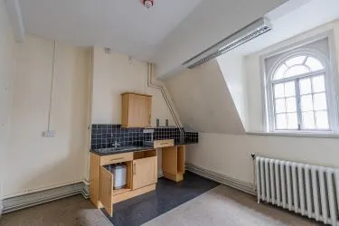 Attractive Grade II listed former bank in this prominent position in the centre of Monmouth with accommodation over three floors including the basement.