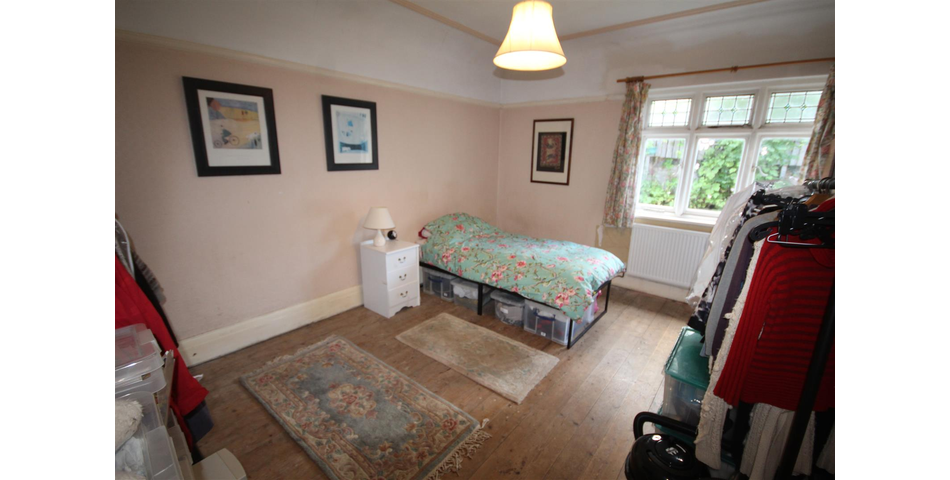 Charming Bungalow on Corner Plot Awaits Transformation