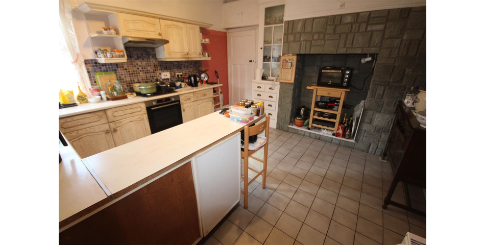 Charming Bungalow on Corner Plot Awaits Transformation