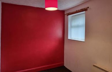 A First Floor One Bedroom Flat Subject to an Assured Shorthold Tenancy Producing £4,940 Per Annum