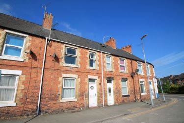A Mid-Terraced Property, Conveniently Located In A Village Centre, Currently Split Into Two Bedsits And Let Producing A Gross Annual Income Of £9600