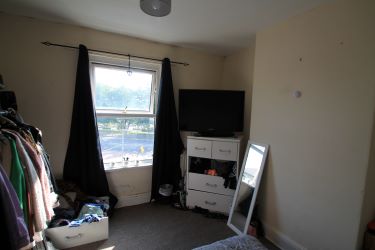 A Mid-Terraced Property, Conveniently Located In A Village Centre, Currently Split Into Two Bedsits And Let Producing A Gross Annual Income Of £9600