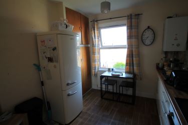 A Mid-Terraced Property, Conveniently Located In A Village Centre, Currently Split Into Two Bedsits And Let Producing A Gross Annual Income Of £9600