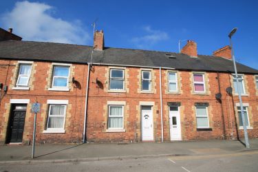 A Mid-Terraced Property, Conveniently Located In A Village Centre, Currently Split Into Two Bedsits And Let Producing A Gross Annual Income Of £9600