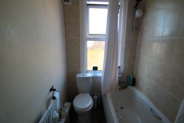 A Mid-Terraced Property, Conveniently Located In A Village Centre, Currently Split Into Two Bedsits And Let Producing A Gross Annual Income Of £9600
