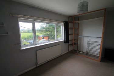 This two bedroom terrace property stands in the village of Gronant which is just 2 miles outside of Prestatyns main town centre and full array of shops and public services. The accommodation comprises offers a lounge, kitchen with conservatory off, two bedrooms and spacious bathroom along with good size rear gardens. uPVC double glazing and gas central heating.