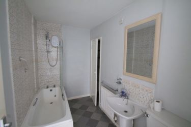 This two bedroom terrace property stands in the village of Gronant which is just 2 miles outside of Prestatyns main town centre and full array of shops and public services. The accommodation comprises offers a lounge, kitchen with conservatory off, two bedrooms and spacious bathroom along with good size rear gardens. uPVC double glazing and gas central heating.