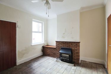 A pleasant, terraced property in New Catton, Norwich, perfect for families and couples looking for a renovation project with two reception rooms, an open kitchen, two double bedrooms, and potential to create a wonderful home in a vibrant community.
