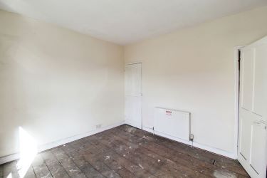 A pleasant, terraced property in New Catton, Norwich, perfect for families and couples looking for a renovation project with two reception rooms, an open kitchen, two double bedrooms, and potential to create a wonderful home in a vibrant community.