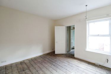 A pleasant, terraced property in New Catton, Norwich, perfect for families and couples looking for a renovation project with two reception rooms, an open kitchen, two double bedrooms, and potential to create a wonderful home in a vibrant community.