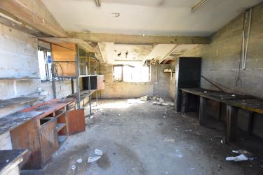 For Sale by online Auction, bidding opens Thursday 28th November at 10:00am. Large storage unit/ garage with land to side in Chapeltown, Sheffield. Close to M1 & centre of Chapeltown.