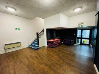 Mason Chambers presents a compelling investment opportunity located on Manchester Road in the bustling town of Haslingden. This versatile property offers a prominent high street position in a well-established commercial area, ideal for a range of business uses.