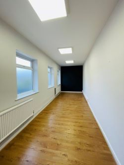 Mason Chambers presents a compelling investment opportunity located on Manchester Road in the bustling town of Haslingden. This versatile property offers a prominent high street position in a well-established commercial area, ideal for a range of business uses.