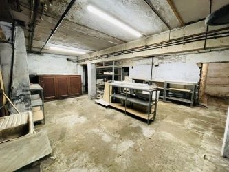 Mason Chambers presents a compelling investment opportunity located on Manchester Road in the bustling town of Haslingden. This versatile property offers a prominent high street position in a well-established commercial area, ideal for a range of business uses.