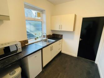 Mason Chambers presents a compelling investment opportunity located on Manchester Road in the bustling town of Haslingden. This versatile property offers a prominent high street position in a well-established commercial area, ideal for a range of business uses.