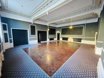 Mason Chambers presents a compelling investment opportunity located on Manchester Road in the bustling town of Haslingden. This versatile property offers a prominent high street position in a well-established commercial area, ideal for a range of business uses.