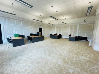 Mason Chambers presents a compelling investment opportunity located on Manchester Road in the bustling town of Haslingden. This versatile property offers a prominent high street position in a well-established commercial area, ideal for a range of business uses.