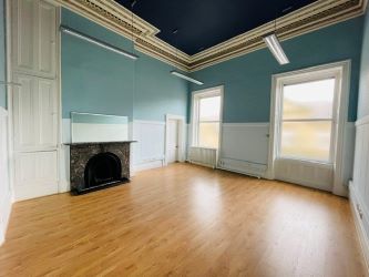 Mason Chambers presents a compelling investment opportunity located on Manchester Road in the bustling town of Haslingden. This versatile property offers a prominent high street position in a well-established commercial area, ideal for a range of business uses.