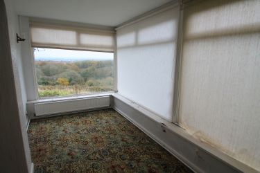 Two Bedroom Detached Bungalow, Being In Need Of A Scheme Of Refurbishment, Having Planning  Consent To Extend The Property To Create An Impressive Three Bedroom Bungalow ( reference P/2022/0817), Together With A Plot Which Has Potential To Create A Significant Additional Property, Subject To Consents. Superb Views From An Elevated Plot Towards Wrexham And The Cheshire Plains Beyond.