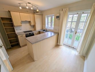 A fine 2 bedroom terraced house in an excellent position overlooking The Abbey, close to the town centre.