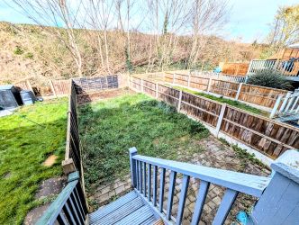 A fine 2 bedroom terraced house in an excellent position overlooking The Abbey, close to the town centre.
