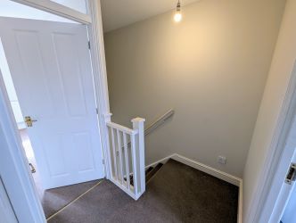 A fine 2 bedroom terraced house in an excellent position overlooking The Abbey, close to the town centre.