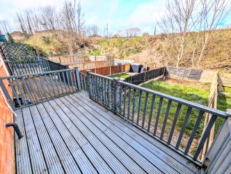 A fine 2 bedroom terraced house in an excellent position overlooking The Abbey, close to the town centre.