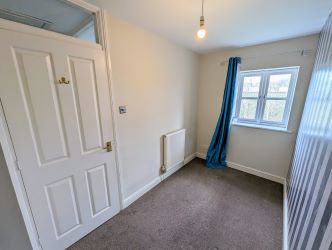 A fine 2 bedroom terraced house in an excellent position overlooking The Abbey, close to the town centre.