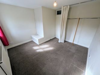 A fine 2 bedroom terraced house in an excellent position overlooking The Abbey, close to the town centre.