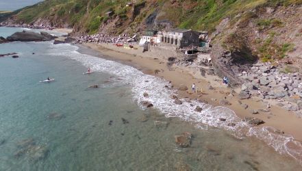 A thrilling chance to own a prime beachfront property with vast potential for future development!