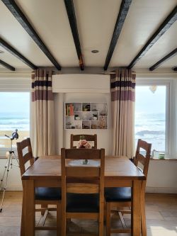 A thrilling chance to own a prime beachfront property with vast potential for future development!