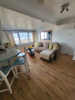A thrilling chance to own a prime beachfront property with vast potential for future development!