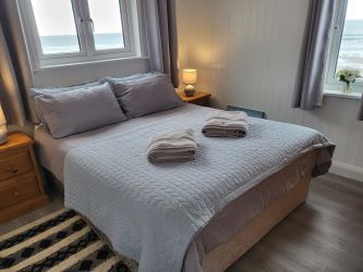 A thrilling chance to own a prime beachfront property with vast potential for future development!