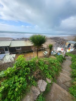 A thrilling chance to own a prime beachfront property with vast potential for future development!