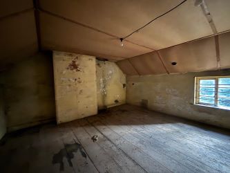 This remarkable opportunity includes an imposing Grade II Listed Building, previously used as offices, with approved planning permission for conversion into a stunning 5-bedroom residence spread across three floors. Additionally, planning consent has been granted to transform the existing garage outbuilding into a charming single-story, 2-bedroom detached home.