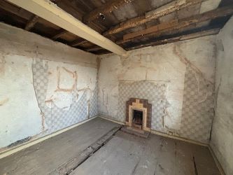 This remarkable opportunity includes an imposing Grade II Listed Building, previously used as offices, with approved planning permission for conversion into a stunning 5-bedroom residence spread across three floors. Additionally, planning consent has been granted to transform the existing garage outbuilding into a charming single-story, 2-bedroom detached home.