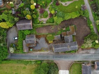This remarkable opportunity includes an imposing Grade II Listed Building, previously used as offices, with approved planning permission for conversion into a stunning 5-bedroom residence spread across three floors. Additionally, planning consent has been granted to transform the existing garage outbuilding into a charming single-story, 2-bedroom detached home.