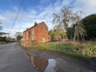 This remarkable opportunity includes an imposing Grade II Listed Building, previously used as offices, with approved planning permission for conversion into a stunning 5-bedroom residence spread across three floors. Additionally, planning consent has been granted to transform the existing garage outbuilding into a charming single-story, 2-bedroom detached home.
