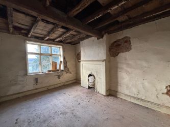 This remarkable opportunity includes an imposing Grade II Listed Building, previously used as offices, with approved planning permission for conversion into a stunning 5-bedroom residence spread across three floors. Additionally, planning consent has been granted to transform the existing garage outbuilding into a charming single-story, 2-bedroom detached home.