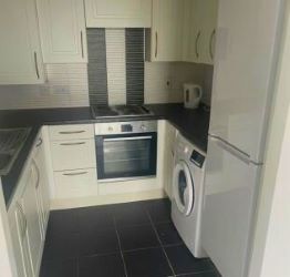 TWO BEDROOM TOP FLOOR APARTMENT