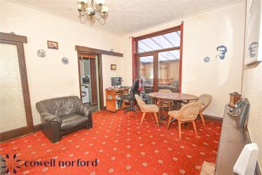 EXTENDED DETACHED 3-BEDROOM HOME WITH MASSIVE POTENTIAL