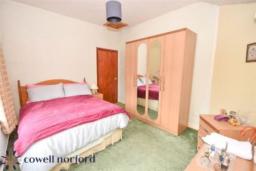 EXTENDED DETACHED 3-BEDROOM HOME WITH MASSIVE POTENTIAL