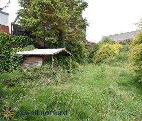 EXTENDED DETACHED 3-BEDROOM HOME WITH MASSIVE POTENTIAL
