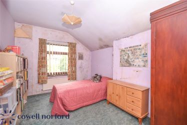 EXTENDED DETACHED 3-BEDROOM HOME WITH MASSIVE POTENTIAL