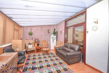 EXTENDED DETACHED 3-BEDROOM HOME WITH MASSIVE POTENTIAL